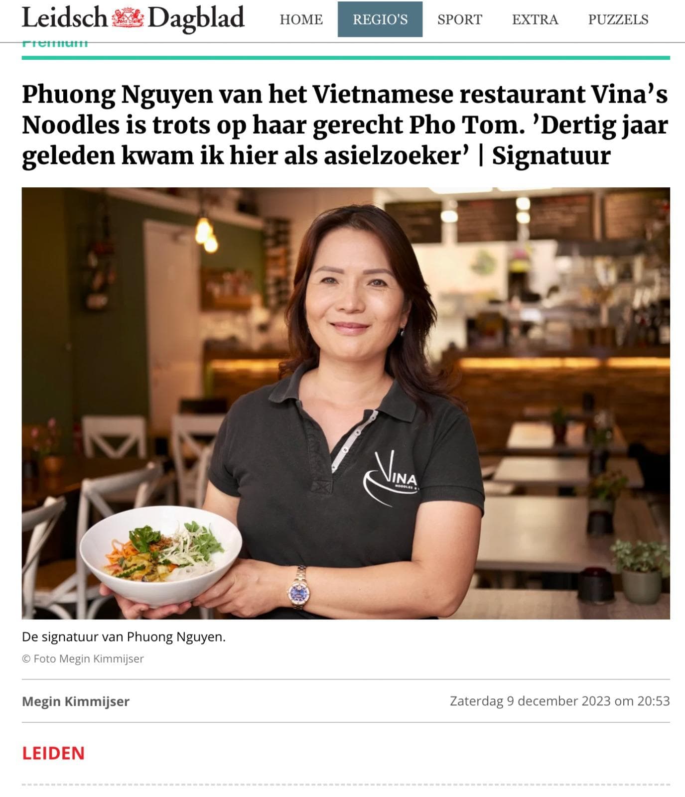 Bowl of Pho Tom shrimp noodles with herbs and vegetables